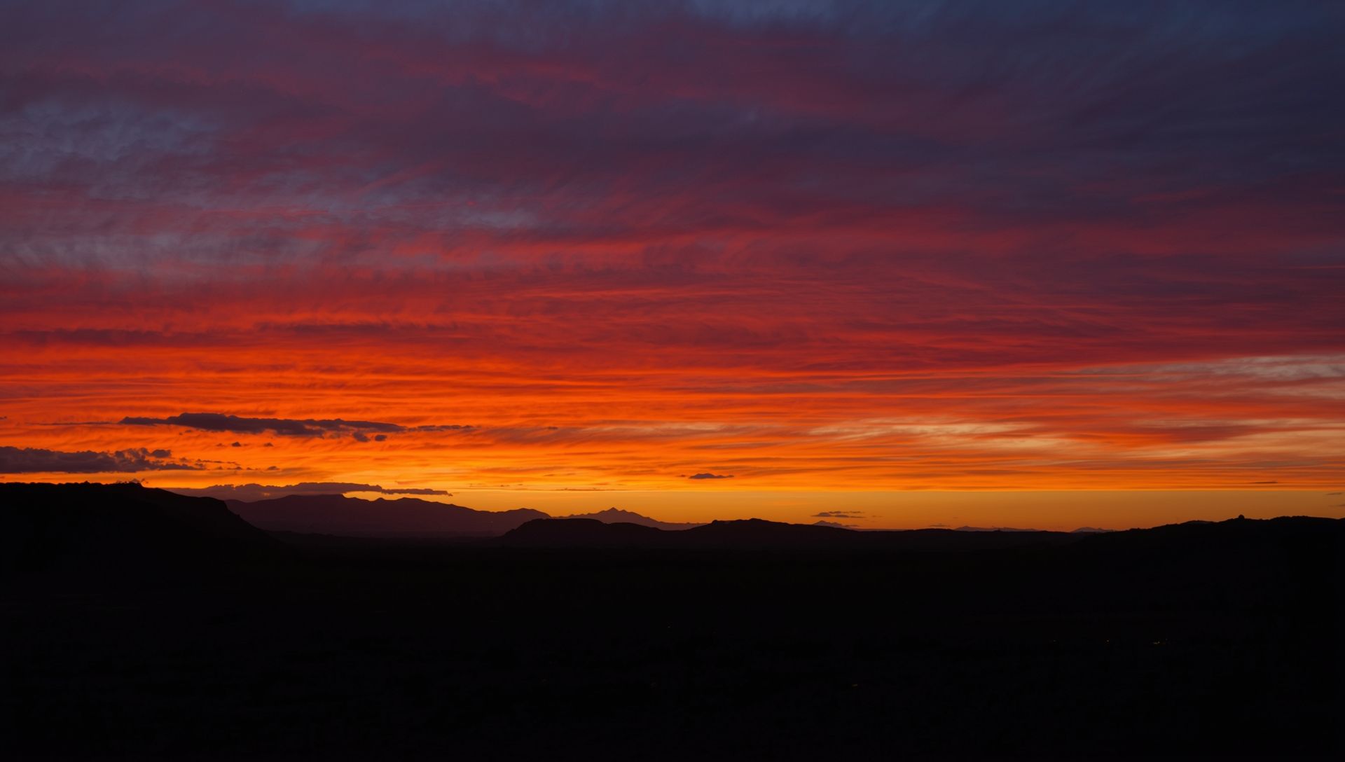 Afterglow of twilight and volcanic skies